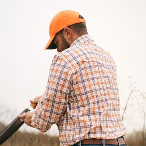 Rear view of Orange/Navy Plaid Pearl Snap Performance Shirt - Sundown Supply Co
