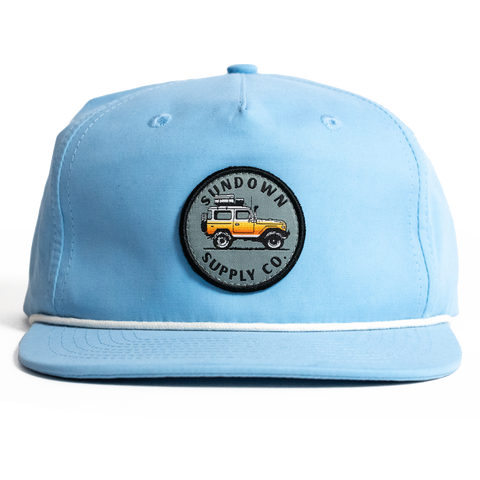 Light blue cap with a logo on a white background
