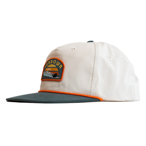 Cap with a logo patch on a white background