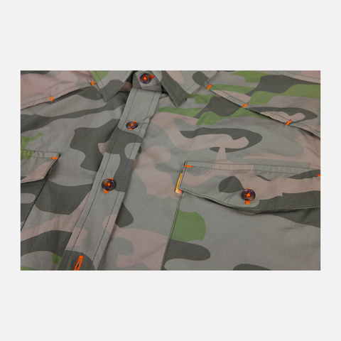 closeup of buttons and front pockets on chest of vintage camo s/s performance field shirt