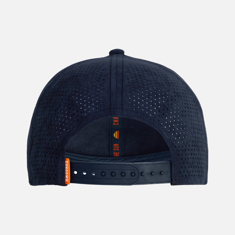 Rear view of Navy Performance Sueded Snapback with orange SUNDOWN label on back and interior orange "CHASE THE SUN" taping