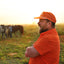 man on ranch wearing s/s blaze performance field shirt and blaze sundown hat