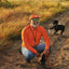 man with dog wearing Long sleeve blaze performance field shirt and blaze sundown hat