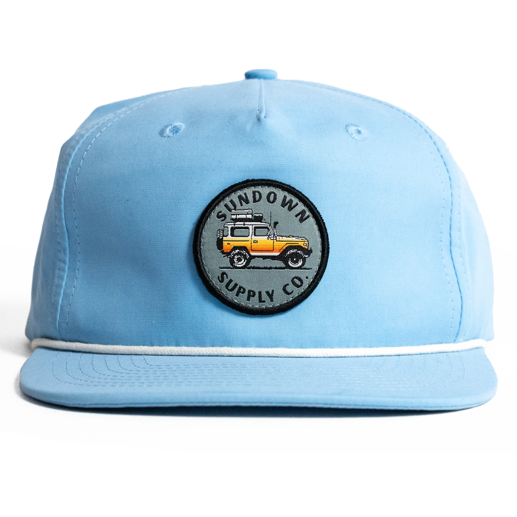 Light blue cap with a logo on a white background