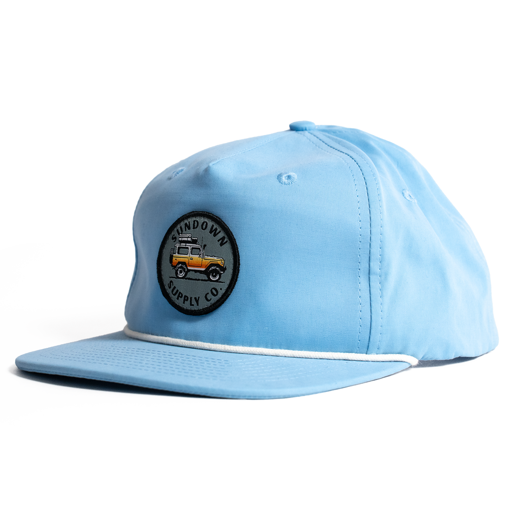 Light blue cap with a logo on a white background