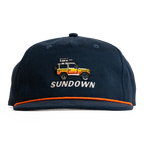 Navy blue cap with embroidered design and 'Sundown' text on a white background