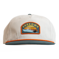 Beige cap with a Sundown logo on a white background