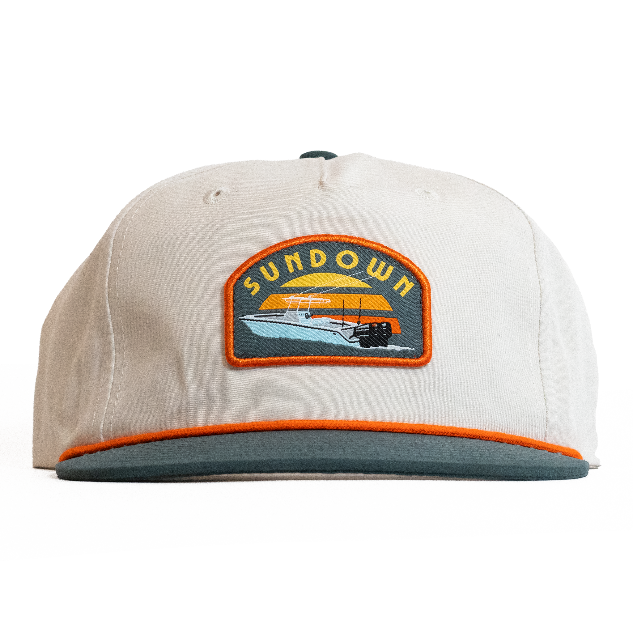 Beige cap with a Sundown logo on a white background