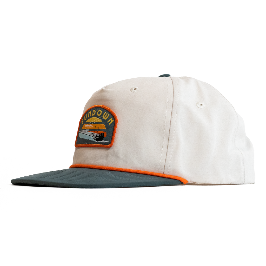 Cap with a logo patch on a white background