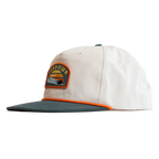 Cap with a logo patch on a white background