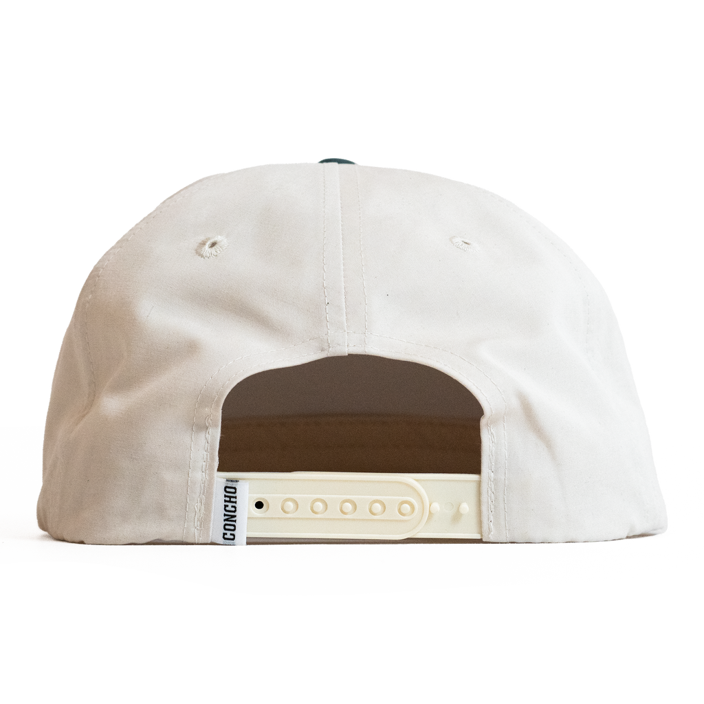 Back view of a beige cap with a brown patch and visible brand logo on a white background