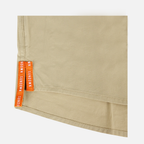 closeup of side seam of Long sleeve Khaki performance field shirt showing text "SUNDOWN" - Sundown Supply Co