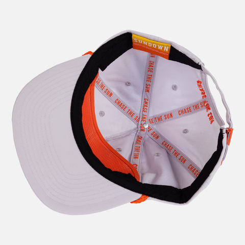 Interior view of Moonstone Unstructured 5-Panel Rope Cap showing interior taping with text "CHASE THE SUN"