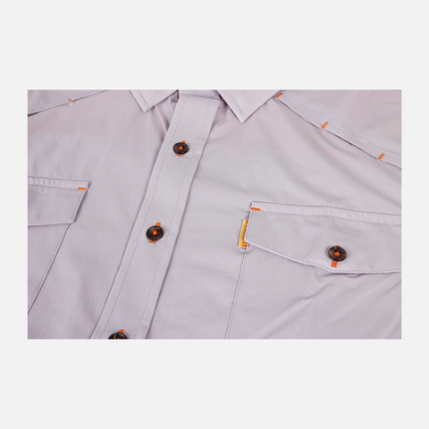 closeup of buttons and front pockets on chest of Moonstone s/s performance field shirt