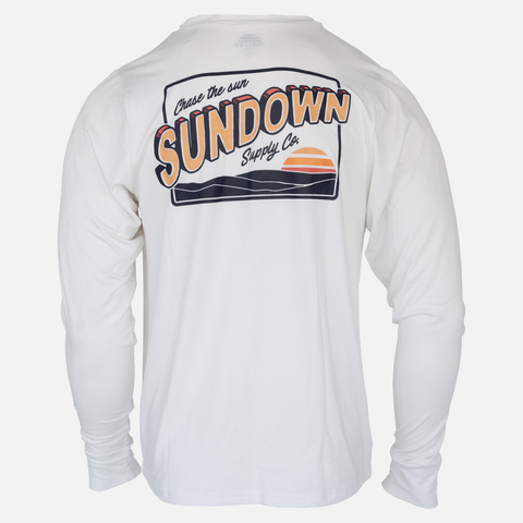 rear view of White Greetings Bamboo Sun Crew L/S showing sunset graphic on back with text "Chase the sun SUNDOWN Supply Co."