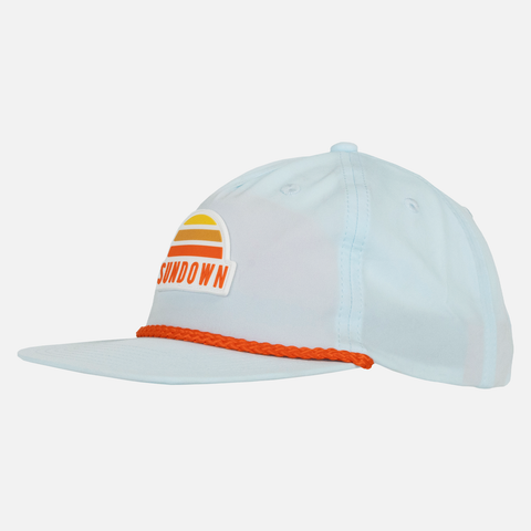 side view of Faded Sky Unstructured 5-Panel Rope Cap with orange rope across front and sundown logo patch on forehead