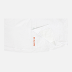 loseup of blaze "chase the sun" embroidered text on interior buttons of white s/s performance field shirt